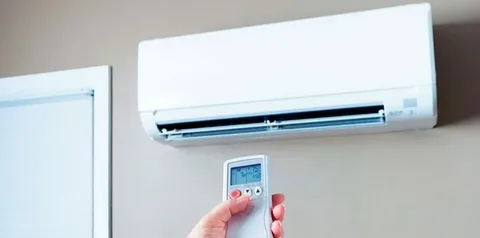 The image shows an air conditioner remote control